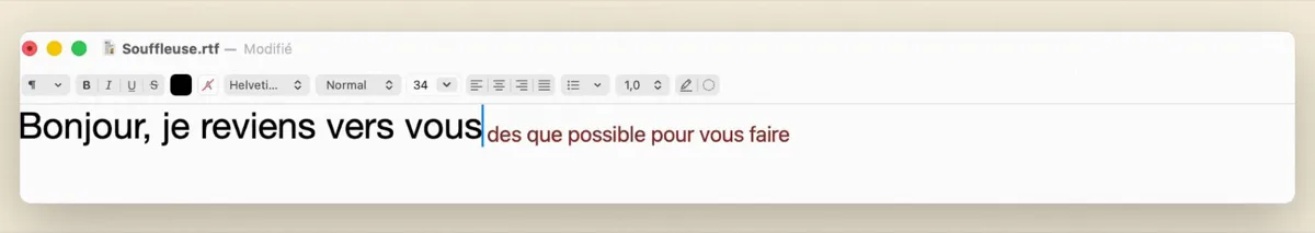 Mac autocomplete in TextEdit: the typed sentence in black, Souffleuse's suggested continuation in red right after the cursor.